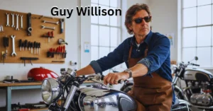 Guy Willison building a custom motorcycle in his workshop, showcasing his skills as a designer and TV personality